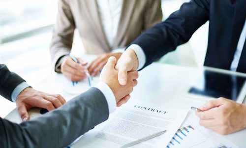 Handshake-over-Contract-500x300 Handshake-over-Contract-500x300